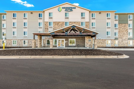 Exterior. WoodSpring Suites Charlotte - University Research Park