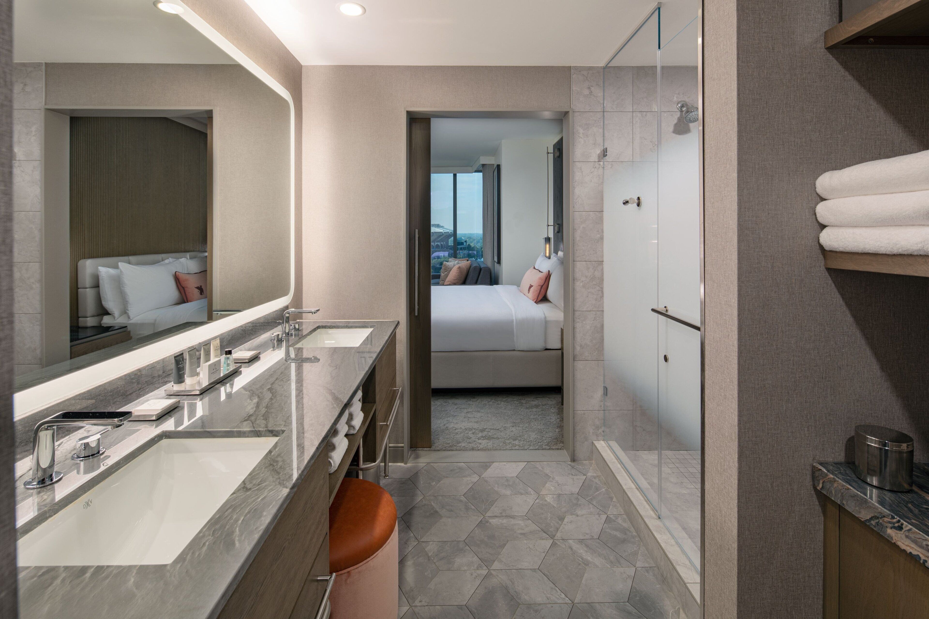 rainfall showerhead, designer toiletries, hair dryer, bathrobes