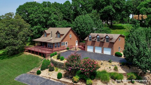 Beautiful Home on 18 acres with view of Beaver Lake and lake access.