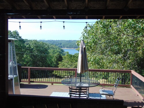Beautiful Home on 18 acres with view of Beaver Lake and lake access.