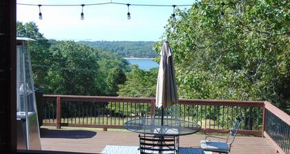 Beautiful Home on 18 acres with view of Beaver Lake and lake access.