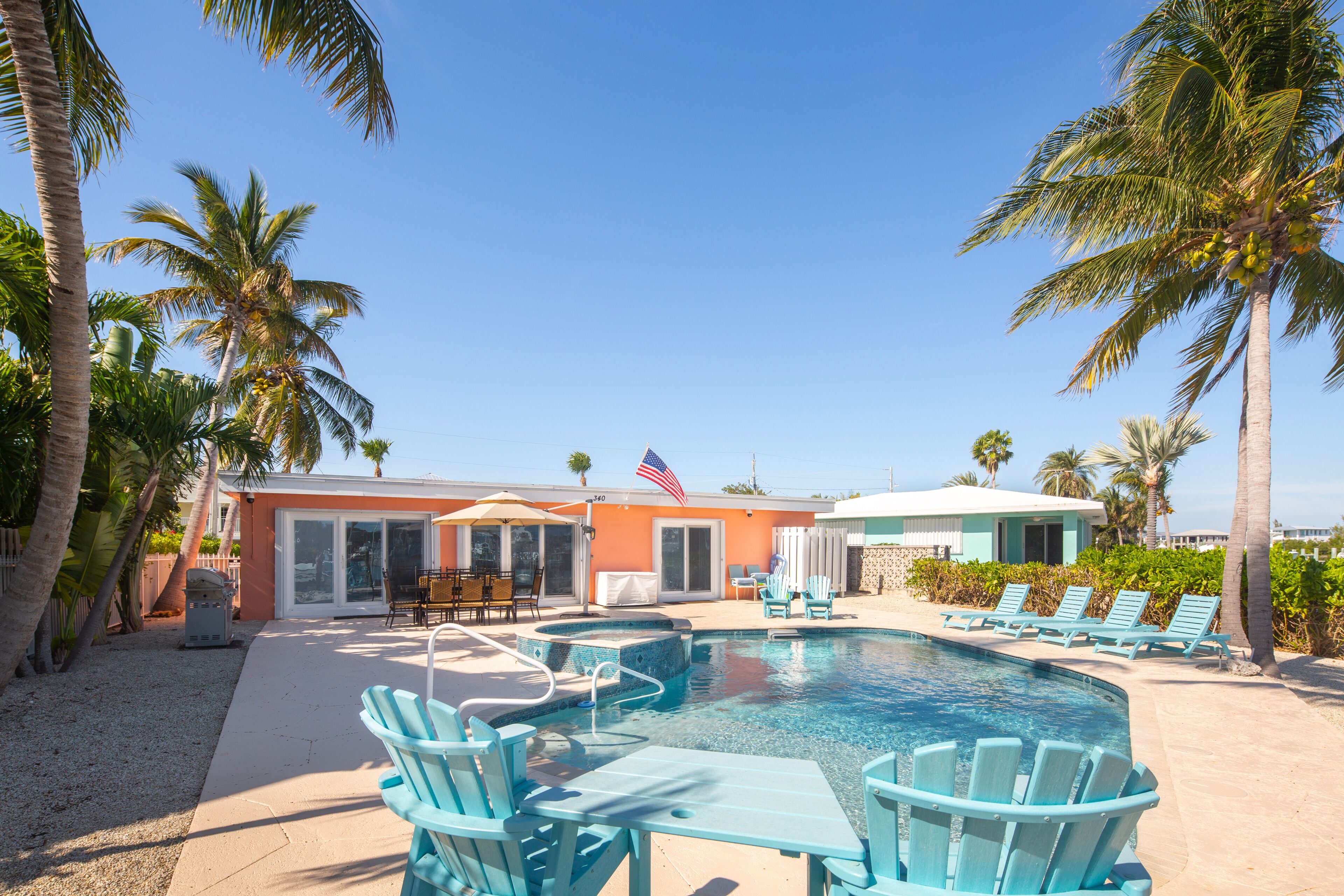 Waterfront home with Cabana Club access, private pool, spa, & dock