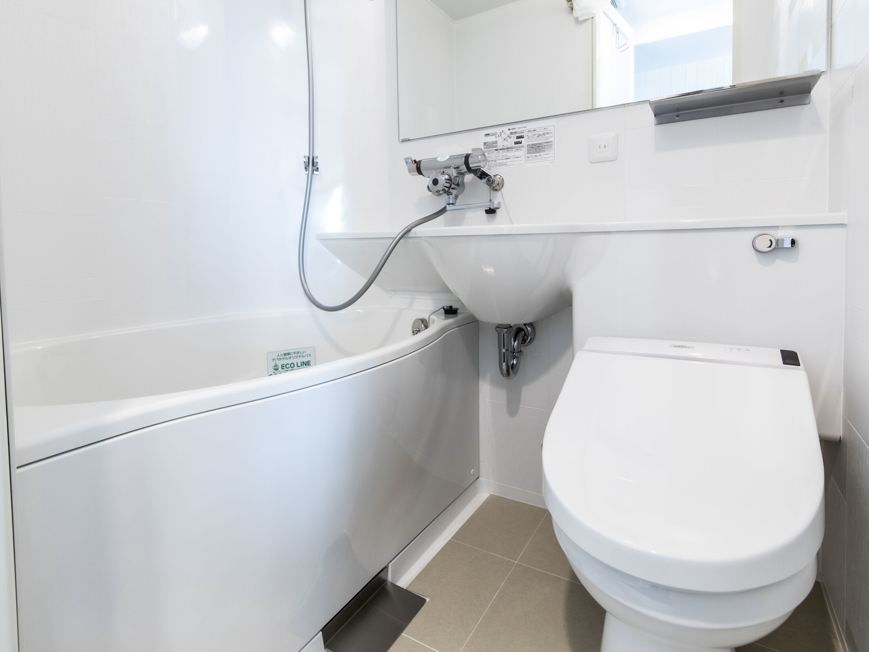 combined shower/bathtub, free toiletries, hair dryer, slippers