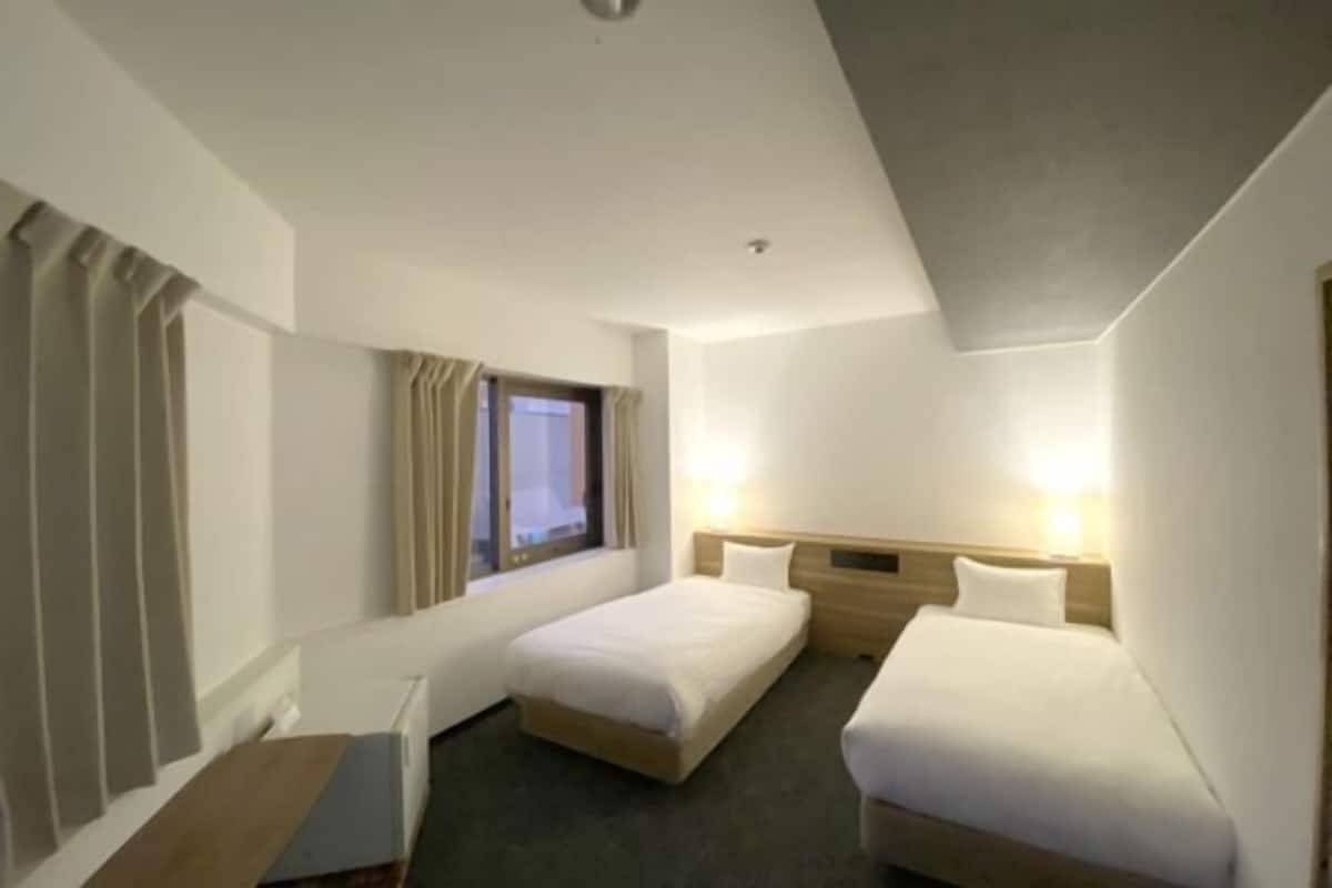 Desk, laptop workspace, free WiFi, bed sheets