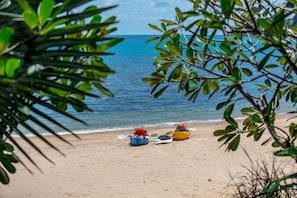 Enjoy kayaking and paddleboarding on the calm waters surrounded by lush greenery.