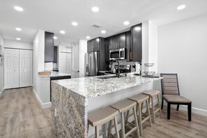 Private kitchen - 🌊 New Listing! Madeira Norte #412 — Newly Renovated Interior Gulf Front Corner Condo (Madeira Beach)