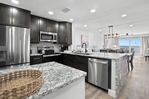 Private kitchen - 🌊 New Listing! Madeira Norte #412 — Newly Renovated Interior Gulf Front Corner Condo (Madeira Beach)