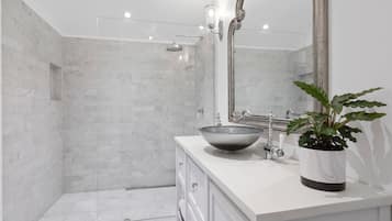 Bathtub, eco-friendly toiletries, hair dryer, soap