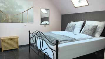 2 bedrooms, travel crib, WiFi, bed sheets