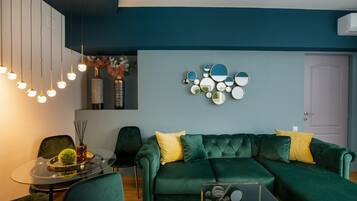 Exclusive Apartment | Living area | 109-cm LCD TV with digital channels, TV