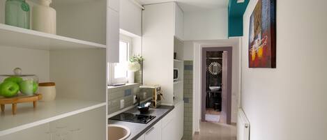 Apartamento exclusivo | Cozinha privada | Frigobar, micro-ondas, cooktop, máquina de café expresso