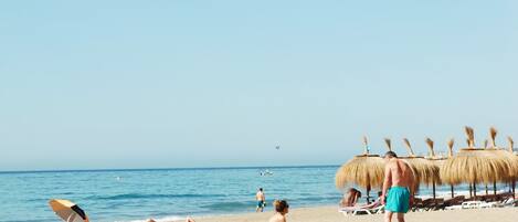 Beach nearby, sun-loungers, beach towels