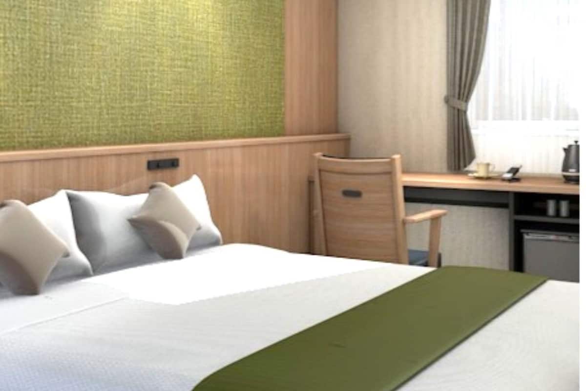 Desk, laptop workspace, blackout curtains, free WiFi