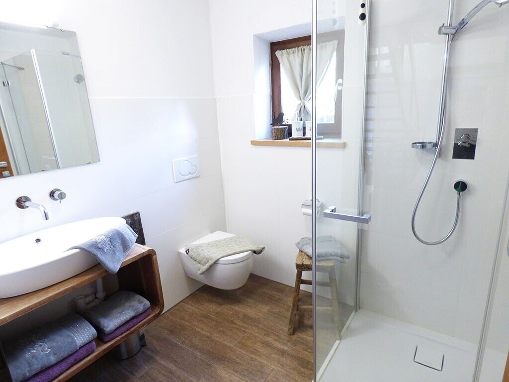 Bathtub, hair dryer, towels