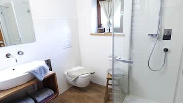 Bathtub, hair dryer, towels