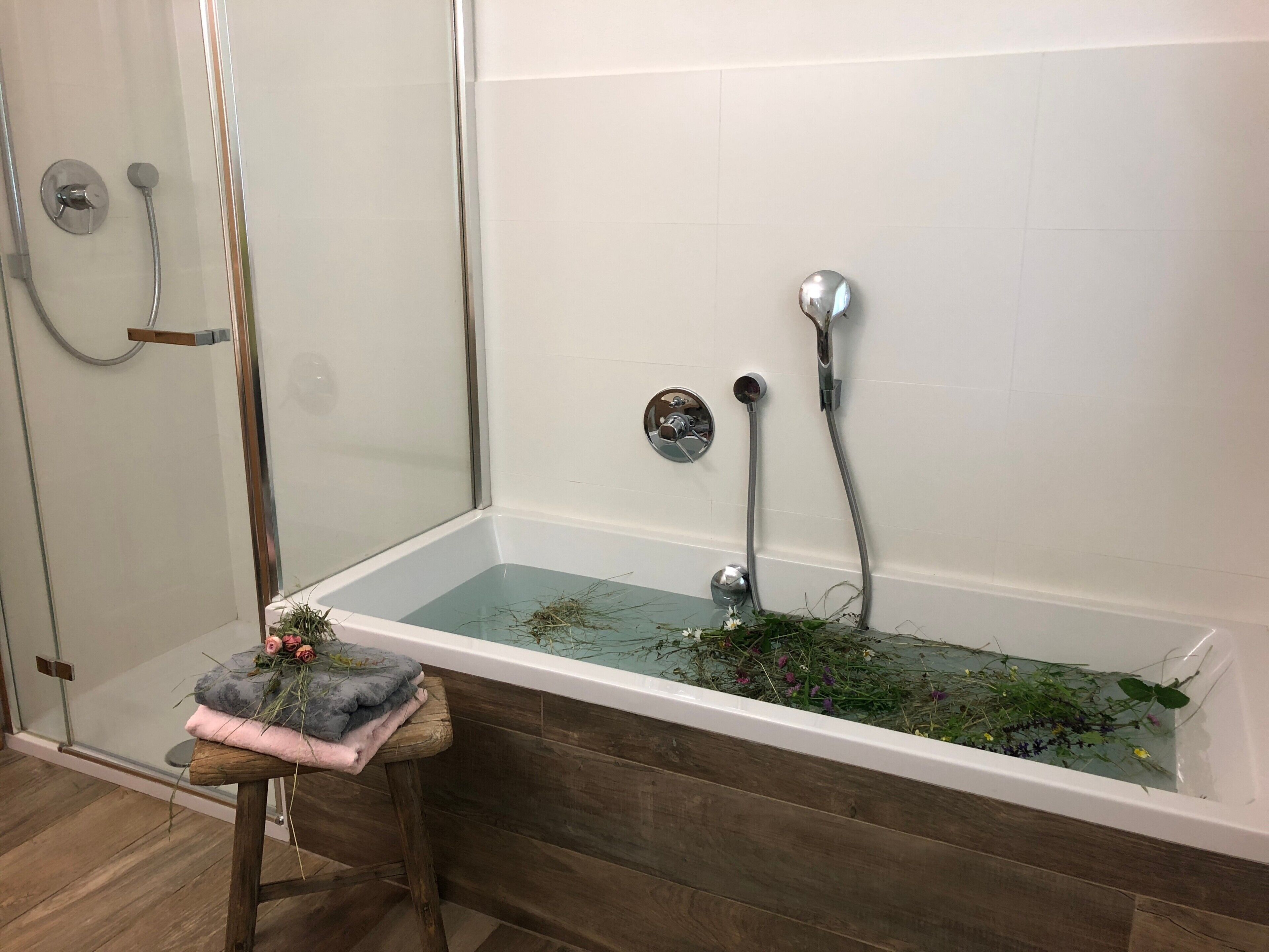 Bathtub, hair dryer, towels