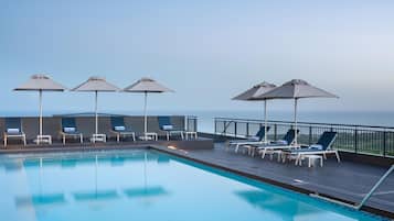 Outdoor pool, open 9:00 AM to 6:00 PM, pool umbrellas, sun loungers
