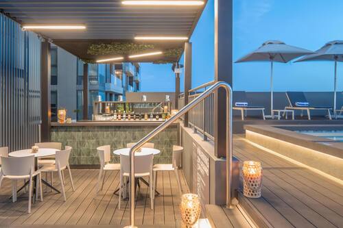 Outdoor pool, open 9:00 AM to 6:00 PM, pool umbrellas, sun loungers