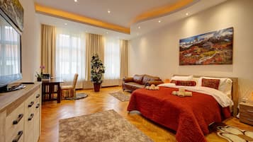 3 slaapkamers, een bureau, een strijkplank/strijkijzer, reisbedje