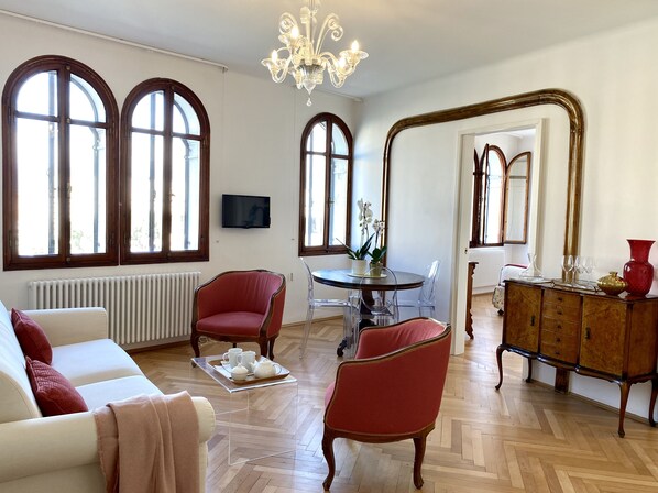 Departamento, 1 habitación | Área de sala de estar | Televisión de pantalla plana 