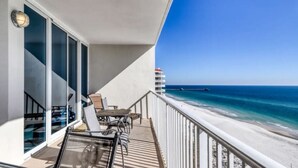 A balcony with a view of the ocean and a pier. - Direct Gulf front, sea breeze! - 3BR/3BA - Lighthouse 1115 - Spectacular views!  (Gulf Shores)