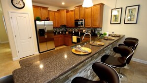 House (1524 Champions Gate) | Private kitchen | Coffee/tea maker, fridge, microwave, stovetop - Champions Gate by PRP (Davenport)