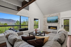 Smart TV, fireplace, foosball