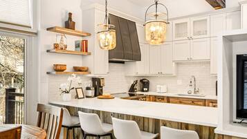Condo (Shadowbrook 506) | Private kitchen | Full-sized fridge, microwave, oven, coffee/tea maker