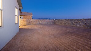 A building with a dirt ground and a stone wall. - Relaxing Oasis Near White Sands National Monument (Las Cruces)