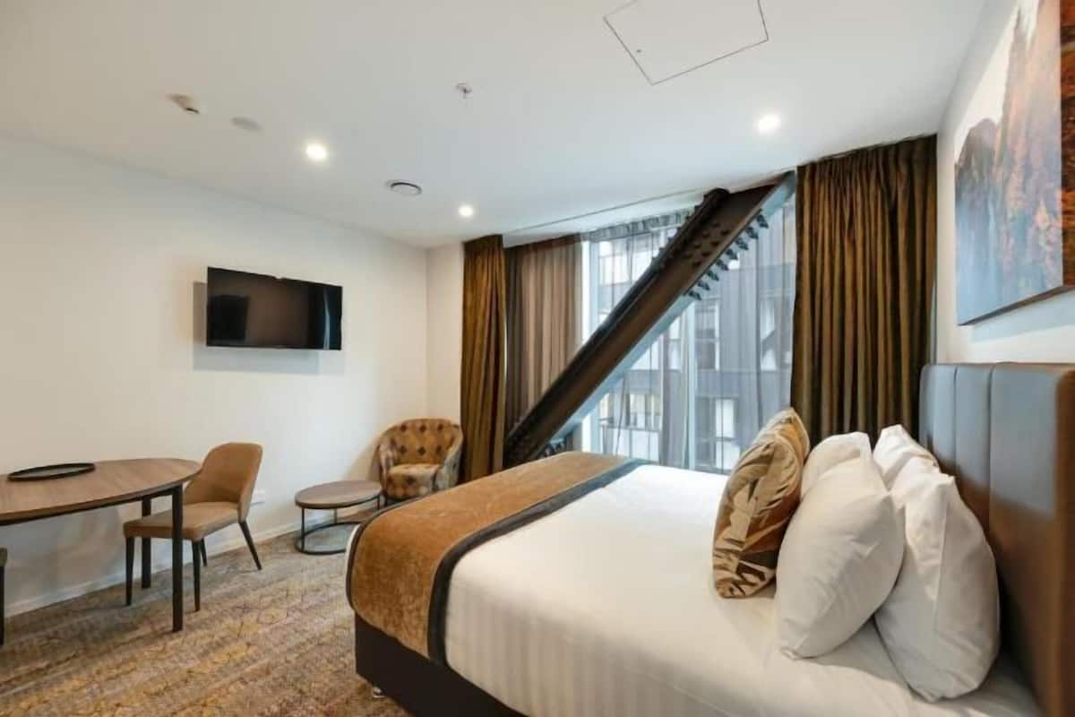 Premium bedding, blackout drapes, soundproofing, iron/ironing board