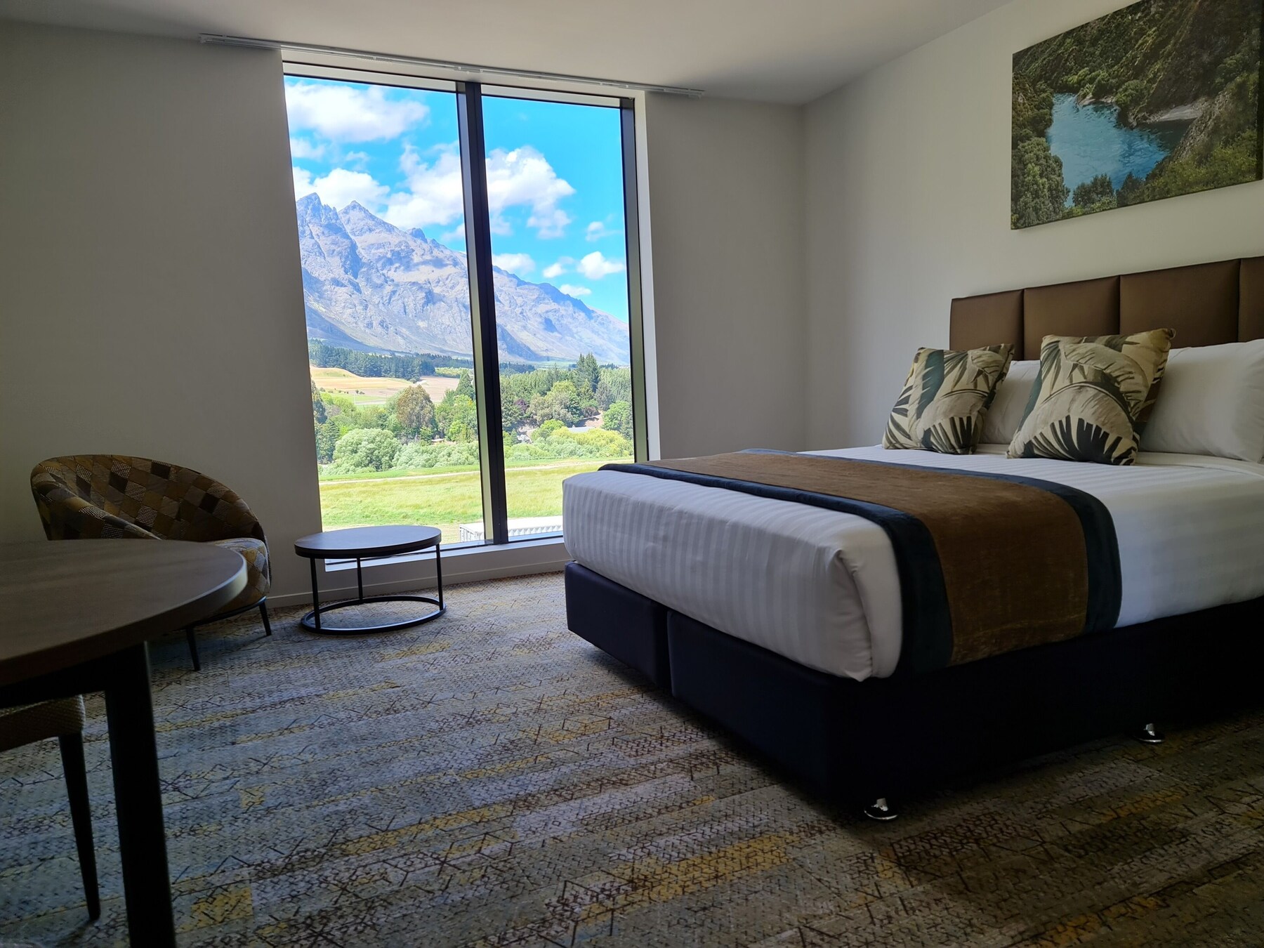 Premium bedding, blackout curtains, soundproofing, iron/ironing board