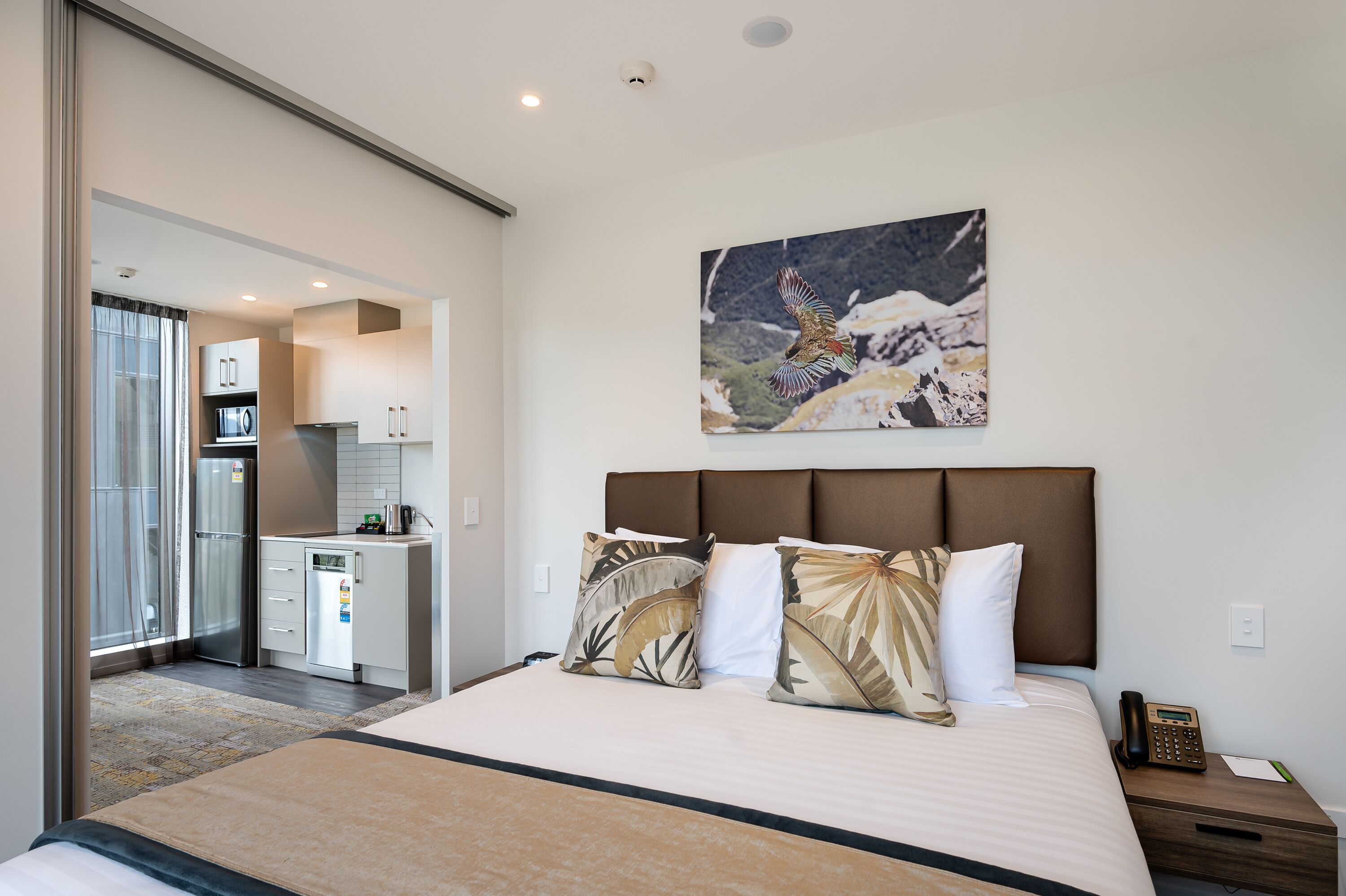 Premium bedding, blackout curtains, soundproofing, iron/ironing board