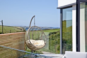 Terrace/patio - Rockpools is a beachside holiday space 500 yards from Cornwalls Watergate Bay (Watergate Bay)