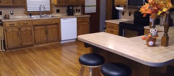 Cedar Log Cabin home on wooded bluff nestled between Springfield and Branson