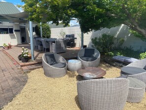 Outdoor dining - Large spacious family friendly home with pool (LANSDOWNE)