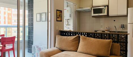 Suite studio exécutive | Aire de séjour | Téléviseur connecté