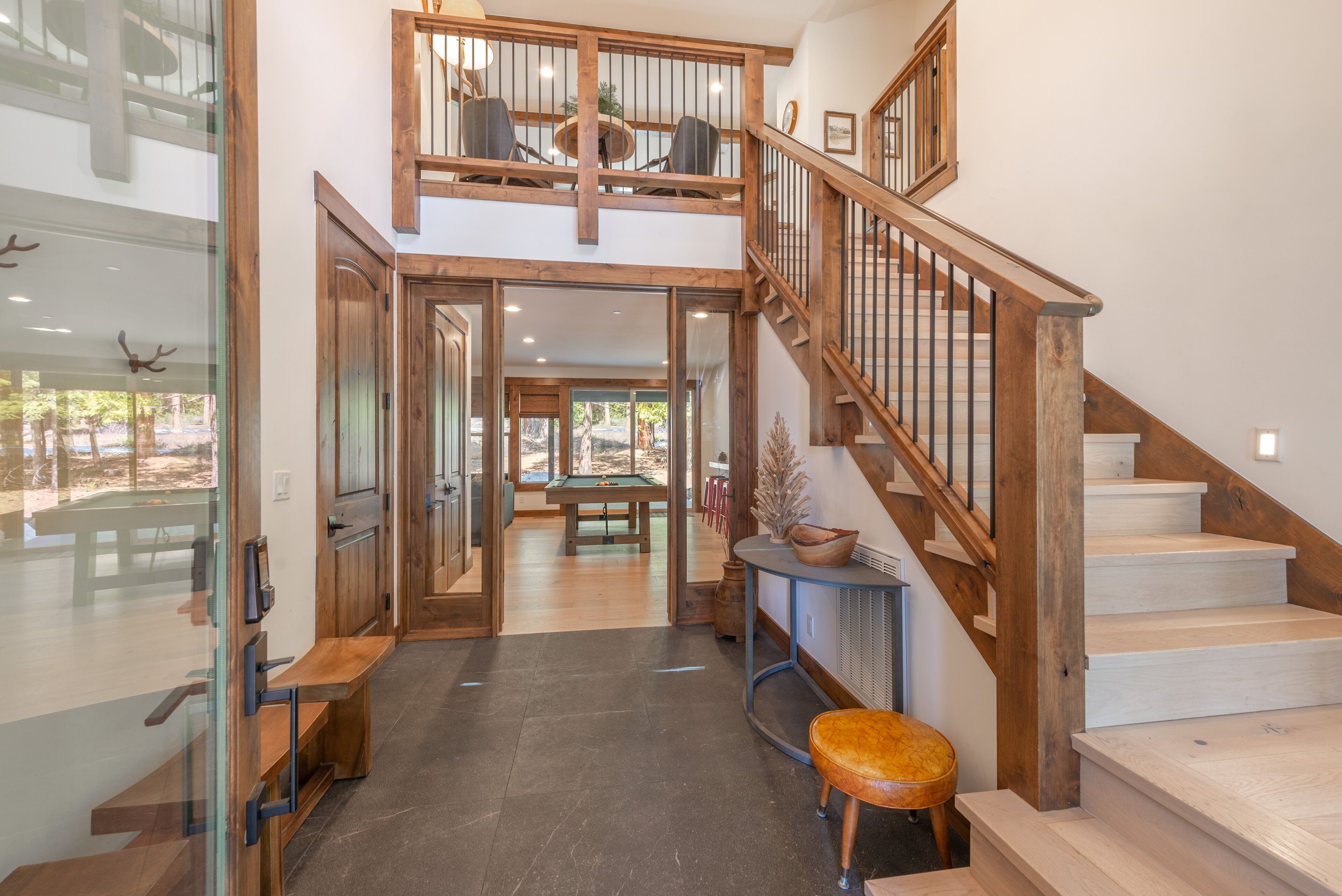 Large foyer on first floor leading into the game room. 
