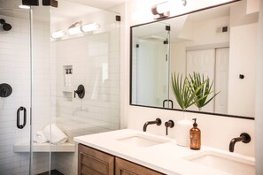 Shower, hair dryer, soap, shampoo