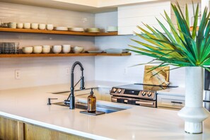 Fridge, microwave, dishwasher, coffee/tea maker - Enjoy Modern Luxury Design in this Oceanfront, Corner Unit!  Stunning Ocean Views & Community Pool. (Folly Beach)