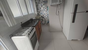 Apartamento tradicional | Cozinha privada | Micro-ondas, fogão, cooktop, liquidificador