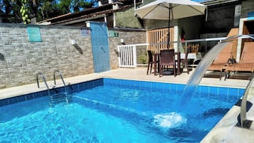 Outdoor pool, pool umbrellas, pool loungers