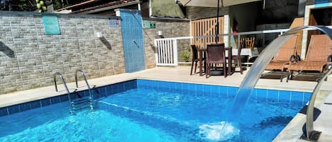 Outdoor pool, pool umbrellas, pool loungers