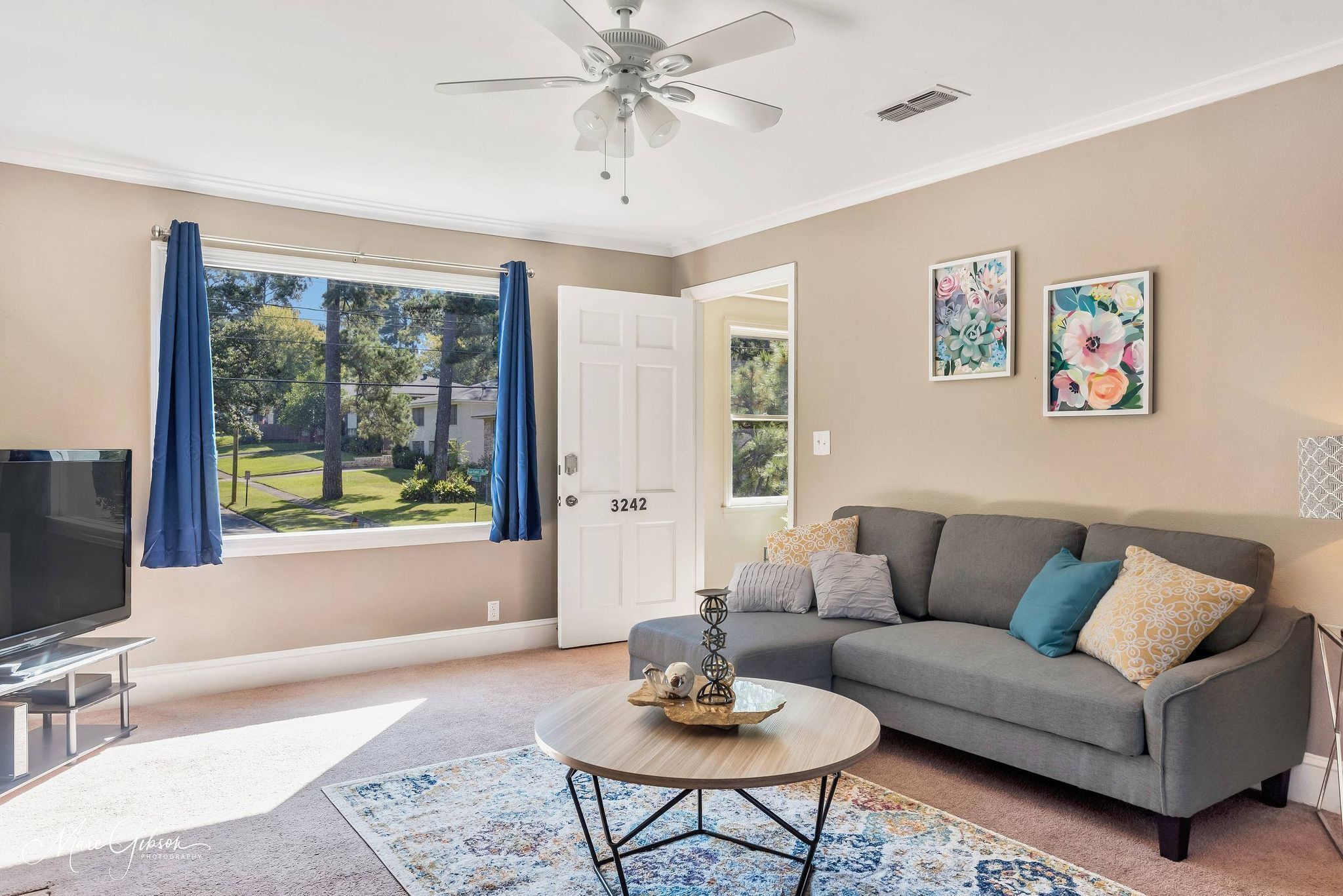 Large windows overlooking streets of historic South Highlands makes this cozy!