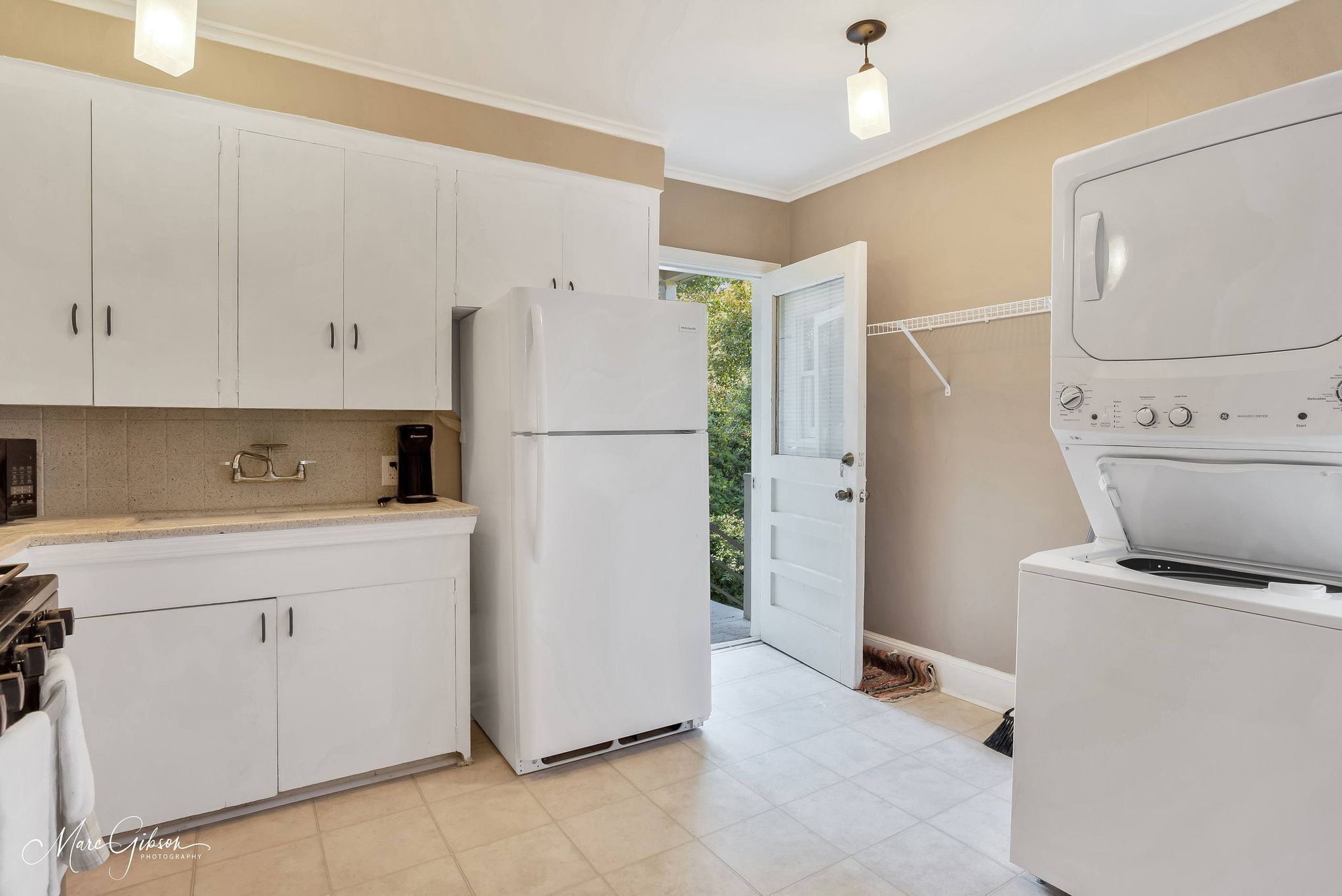 Large windows overlooking streets of historic South Highlands makes this cozy!