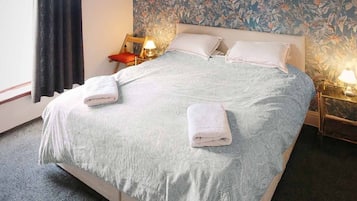 2 slaapkamers, een strijkplank/strijkijzer, gratis wifi, beddengoed