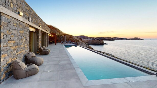 A stone building with a pool and outdoor seating. - Awesome home in Gazi, Heraklio (Gazi, Heraklio)
