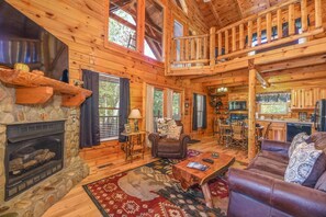 Älytelevisio, takka, videopelejä, pöytäjalkapallopöytä