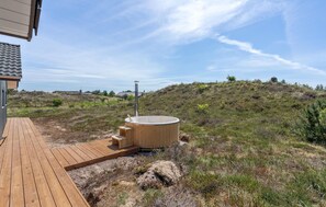Bañera de hidromasaje al aire libre