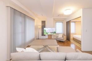 Premium Apartment, 3 Bedrooms, Non Smoking, City View | Living area | Flat-screen TV