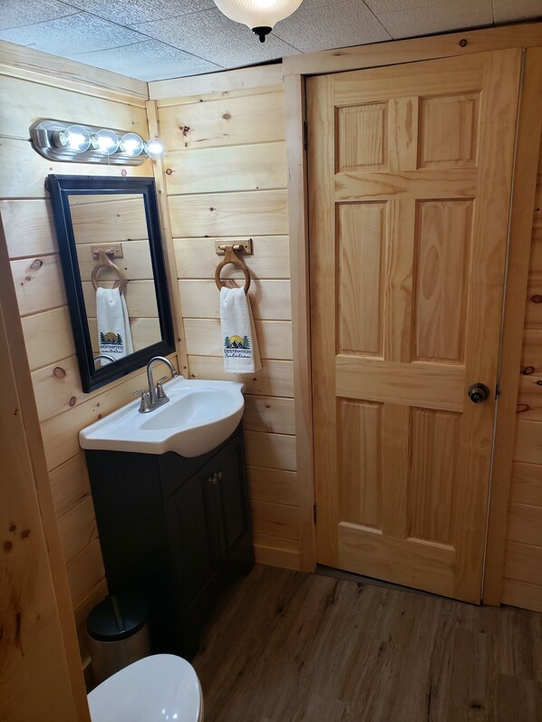 Shower, towels, soap, toilet paper